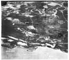 This aerial photograph, taken in October 1942, shows the difficult terrain around the Japanese coastal base.