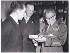 General George C. Kenney USAF at the Australian launch of  his book, `General Kenney Reports' that detailed his time commanding the US 5th Air Force South-West Pacific Area (SWPA) from 1942-44 and US 13th Air Force SWPA 1944-46. Kenney saw the potential of air power in a region as remote and underdeveloped as New Guinea to be the vital factor for success. He organised the first major airlift of Allied ground troops during WW2 and developed tactics and techniques for close air support of ground forces, aerial resupply and long range bombing.