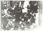 Indian ex-prisoners of war of the 1st Bahawalpur Infantry Regiment receive eggs from a Lance-Naik in their group prior to boarding the transport ship in Sydney that will take them home to India, (20 October 1944).  These men had just refused a meat curry offered by their Australian hosts as the meat had not been prepared by one of their own.  The Muslim, Hindu and Sikh dietary rules and other cultural traditions observed by the Indian soldiers were a complete mystery to most, if not all, the Australians and Americans who encountered them.  Invariably misunderstandings, albeit born of good intentions, occurred.