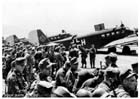 German soldiers of the 5th Mountain Division taking part in the invasion of Crete prepare to board their Junkers Ju 52 transport aircraft, Milos Island, Greece, May 1941.  The battles for Greece and Crete saw the Australians suffer 6,727 casualties at the hands of the Germans.  Despite the ferocity of such fighting the Australians nonetheless saw the Germans as opponents worthy of respect.