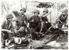 American paratroopers of the 503rd Parachute Regiment pack their equipment and weapons in preparation for their aerial assault to capture the airfield at Nadzab in the Markham River Valley, New Guinea, September 1943.  American troops played a vital role in supporting the Australian forces in New Guinea from the middle of 1942 onwards.  By the beginning of 1944 the American presence in New Guinea had grown to the point where they outnumbered their Australian allies in the region. 